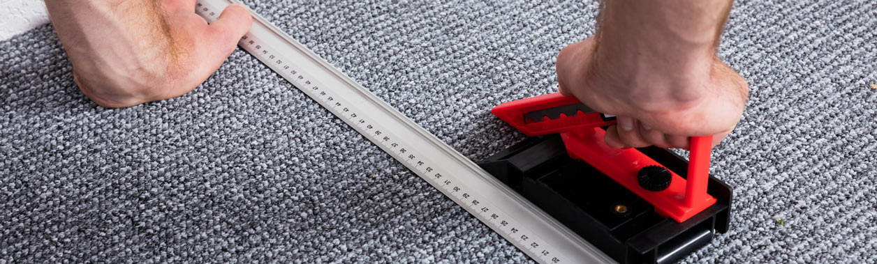 Teppichboden verlegen in Berlin, professionelles Vermessen und zuschneiden des Teppichbodens